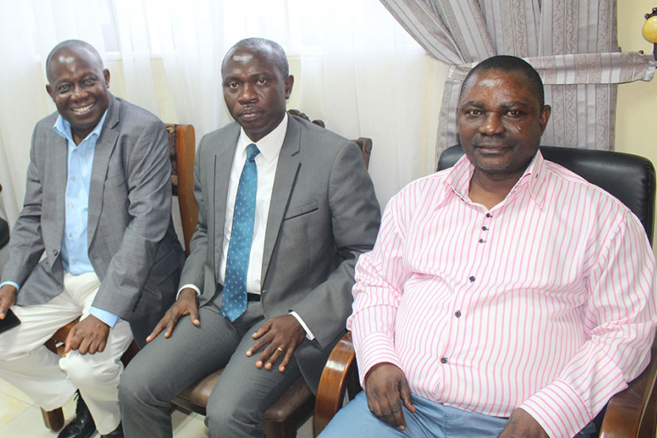 [Mr. Francis Obeng assumes duty as Finance Officer. Flanked by Rev. Fr. Professor Anthony Afful-Broni, (Vice-Chancellor) and Surv. Paul Osei-Barima, Esq. (Registrar)]