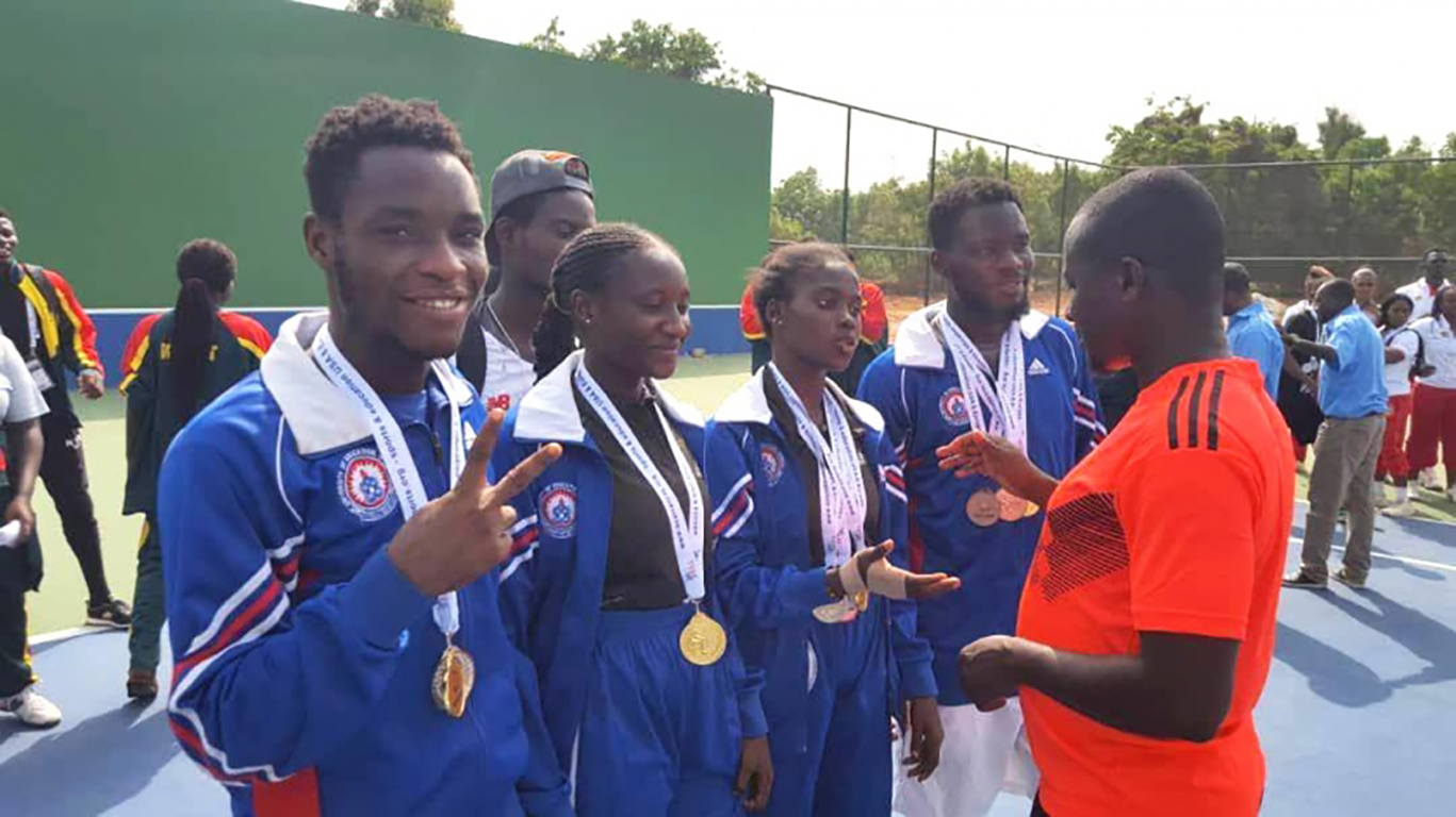 UEW athletes showcasing their medals