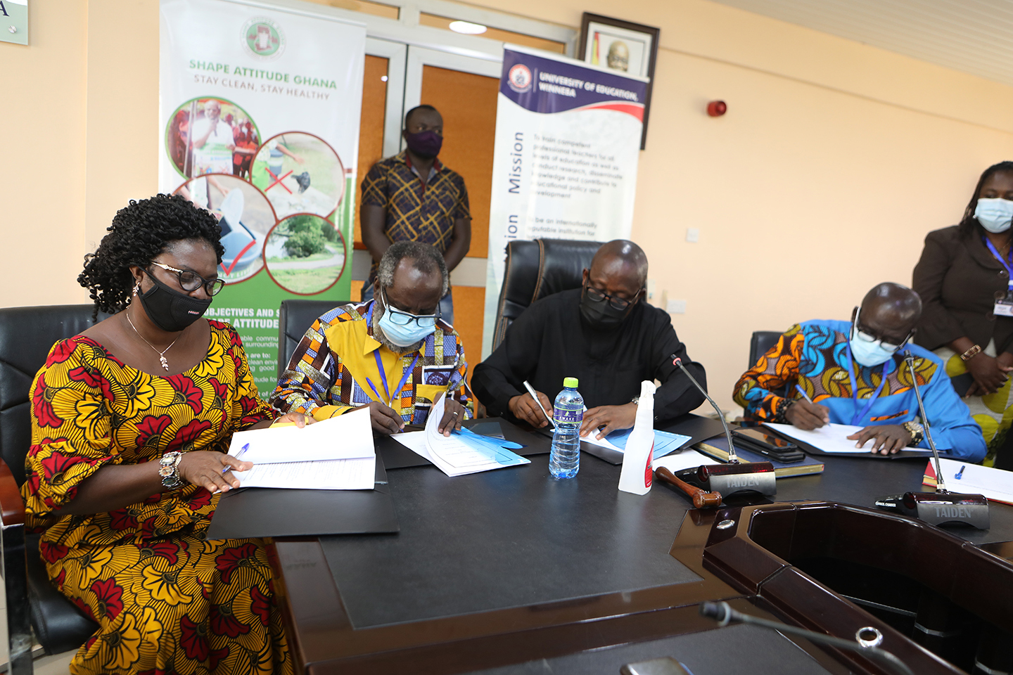 Vice-Chancellor, Rev. Fr. Prof. Anthony Afful-Broni (in black) and CEO of SHAPE Attitude Ghana, Mr. Wonderful Baisie Ghartey (second from left) at the MoU Signing Ceremony