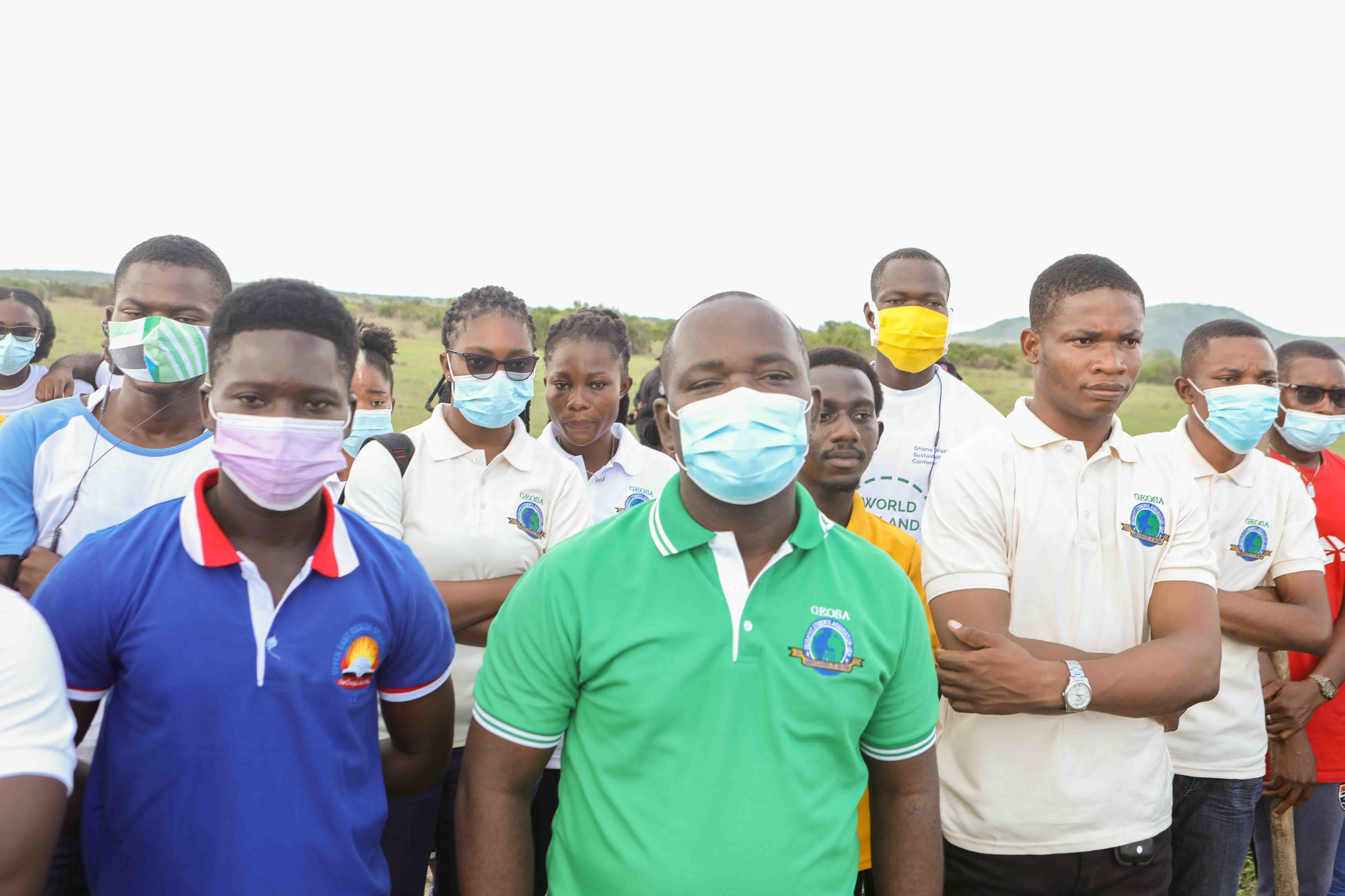 Head of Geography Education, Dr. Enoch Sam (right) with some of his students 