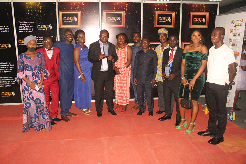 Members of SPED in a euphoric mood at the end of the ceremony after bagging two awards at the event