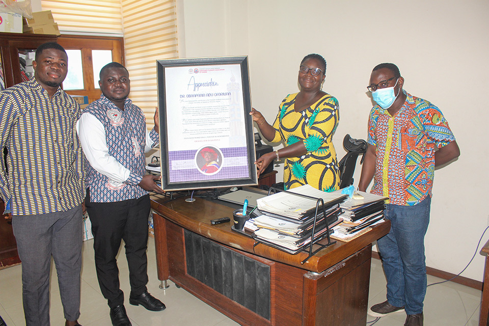 Dr. Obaapanin Oforiwaa Adu flanked by the Head of Department, Publishing and Web Development, Mr. Jojoe Annan (right) and immediate past General Secretary, GRASAG, Mr. Seth Asamoah Badu
