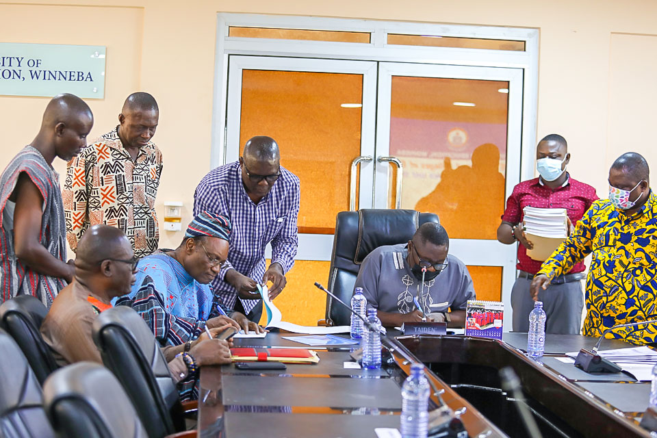 Management members signing the MoU