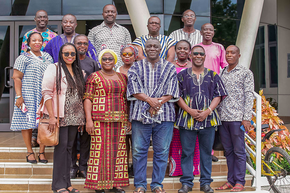 Nana Kobina Nketsiah V (middle) in a group photo with Faculty Members who disseminated the findings of their exploration during the colloquium