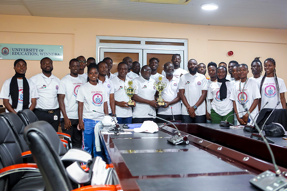 The Vice-Chancellor in a pose with the victorious team at the Council Chamber of UEW