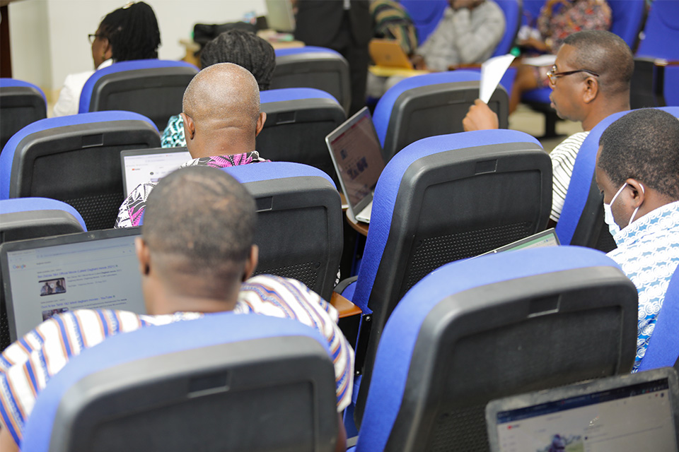 Participants explore emerging trends in research on their laptops