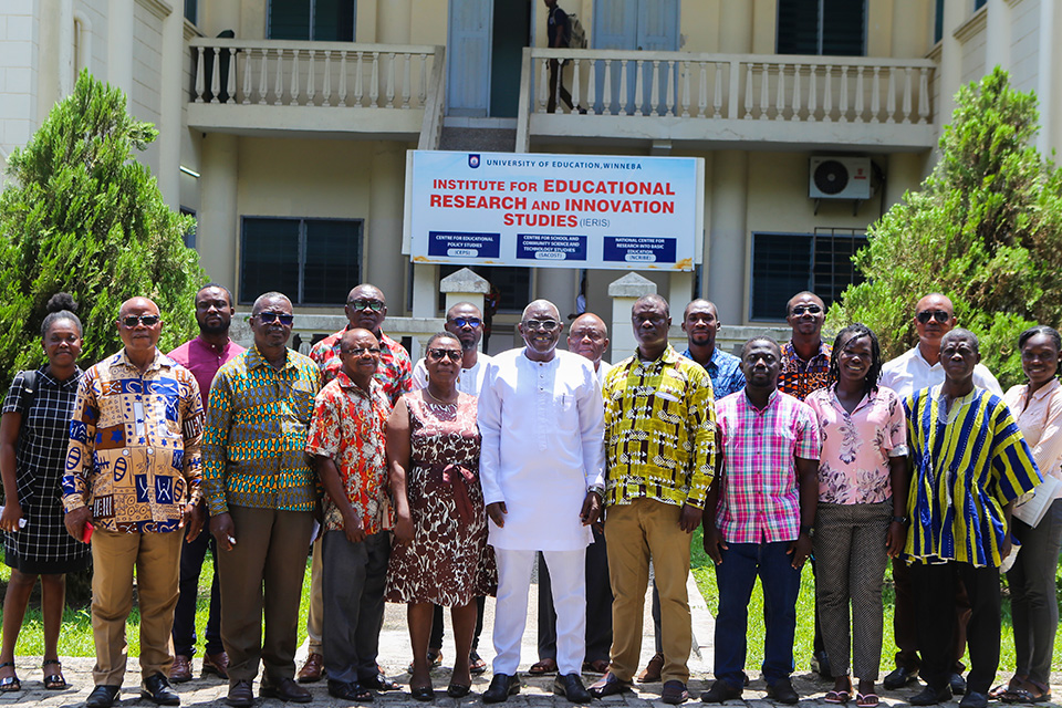 Prof. Avea Nsoh in a pose with the new Director of IERIS and staff