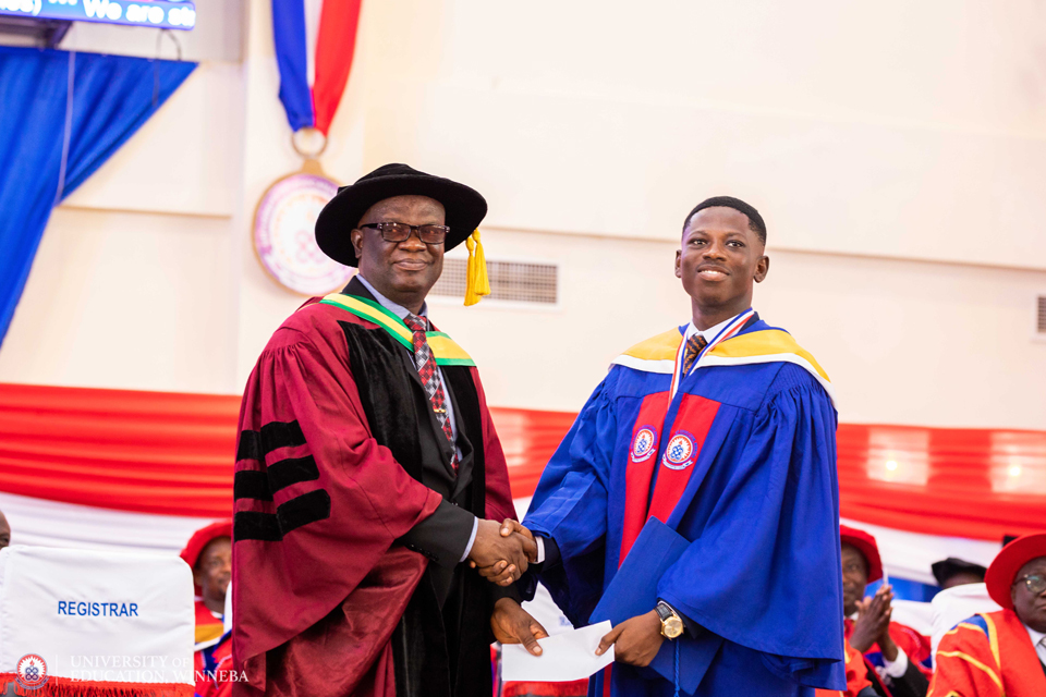 Mr. Marcus Tetteh Obuadey (right) receiving his cash prize for emerging as the best accounting student during the 27th Congregation ceremony 