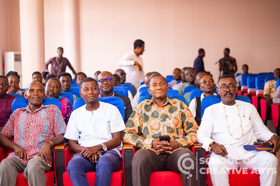 A cross-section of faculty members at the general assembly