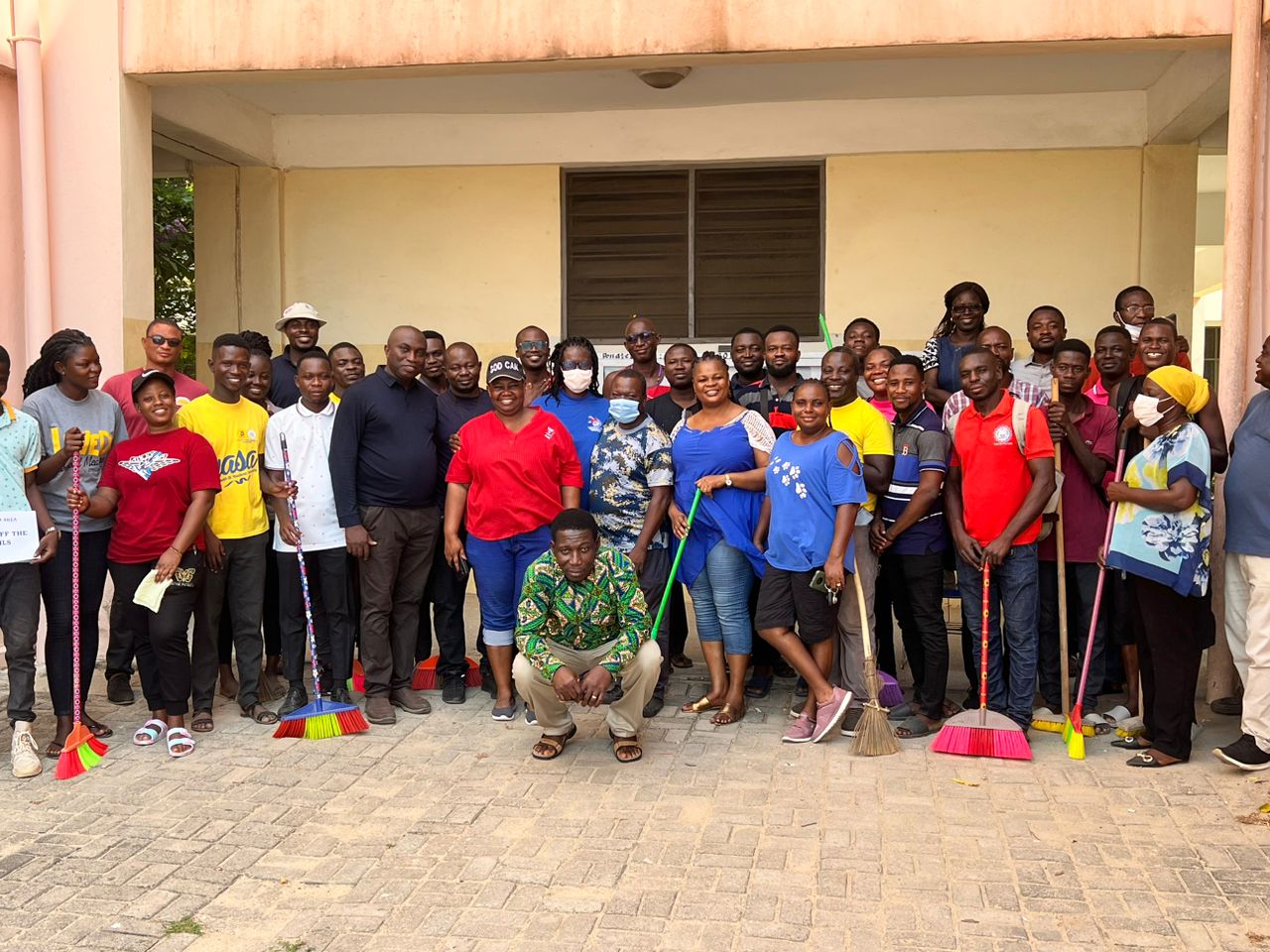 Faculty members after the clean -up exercise