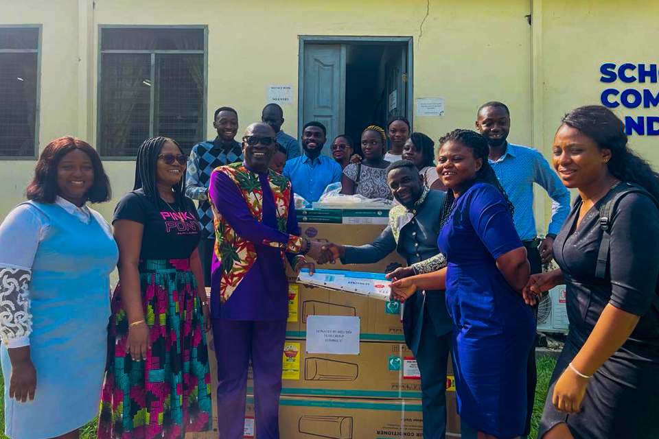 Prof. Andy Ofori-Birikorang (third from left) receiving the items on behalf of SCMS-UEW