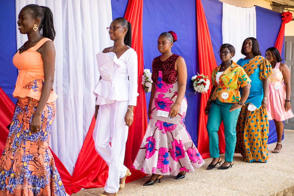 Students strolling down the runway