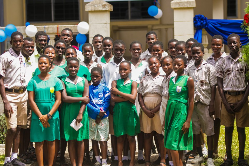 A group picture of basic school students and UEW faculty members 