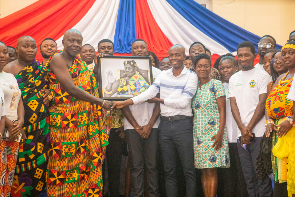 Omanhene Sekyim II (clad in Kente) receiving his citation