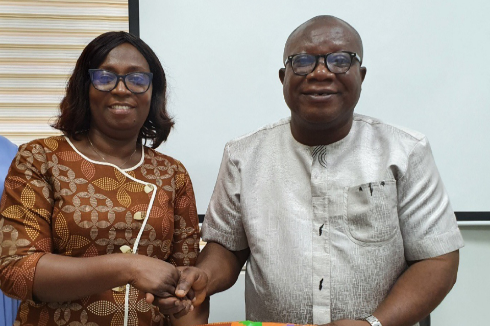 Prof. Eshun receiving a token of appreciation on behalf of Mr. Asare Okae-Anti, FQAO for School of Communication and Media Studies