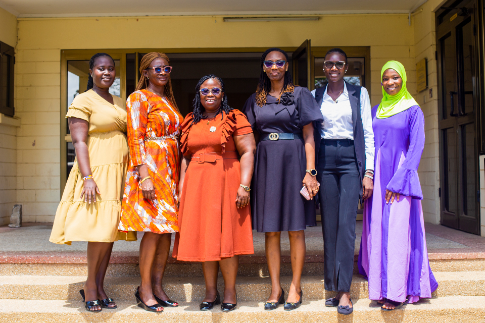 Staff and national service personnel at the Gender Mainstreaming Directorate pose for a photo after the event