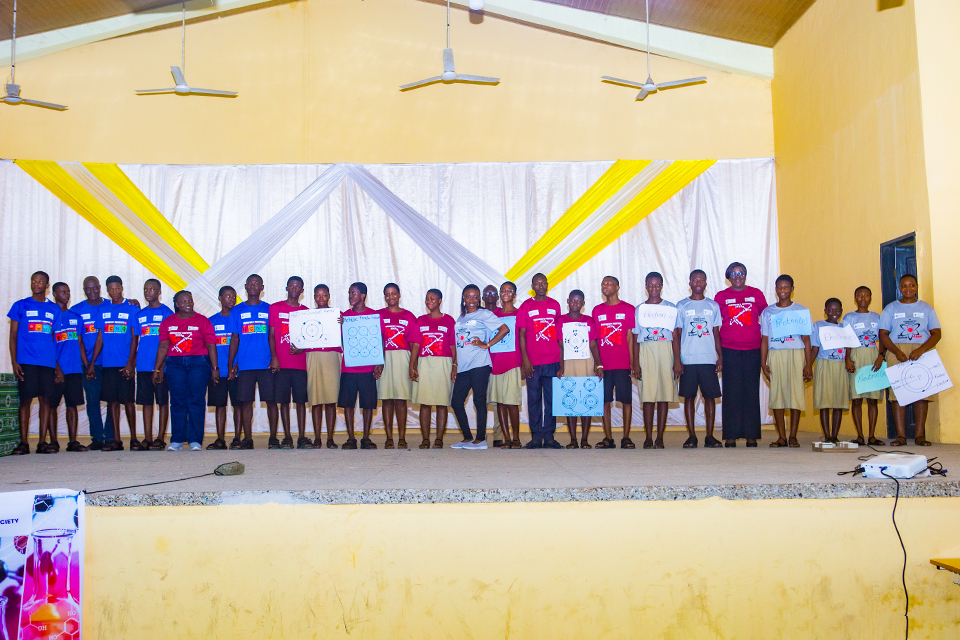 Students who participated in the drama pose for a group photograph