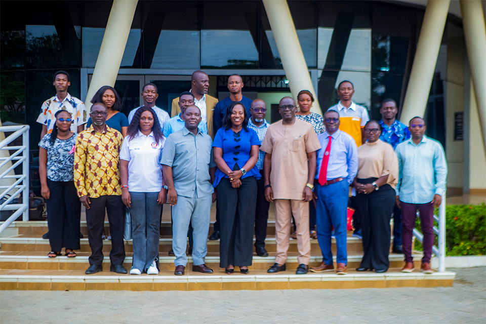 Participants pose for a group photograph after the event
