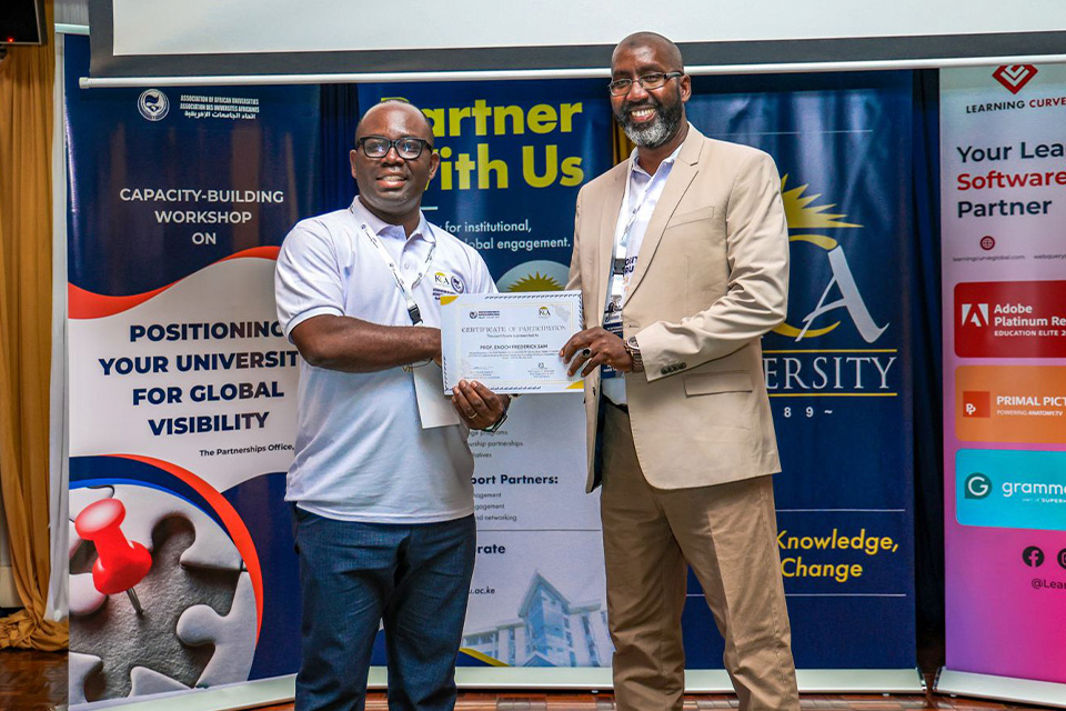 Prof. Enoch Sam (right) receiving a certificate of participation 