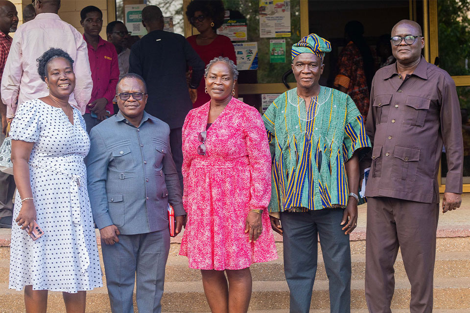 The retirees and the Registrar of UEW in a group photograph 