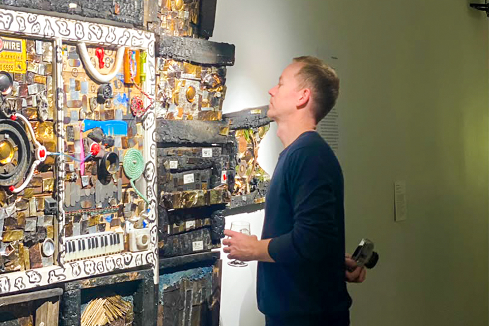 An individual observing the art work