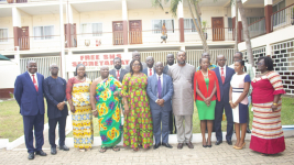 A picture of the Minister of Education, in a pose with the Governing Council members