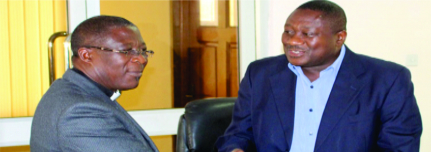 Prof. Mawutor Avoke in a handshake with the Principal of Mampong Technical Institute